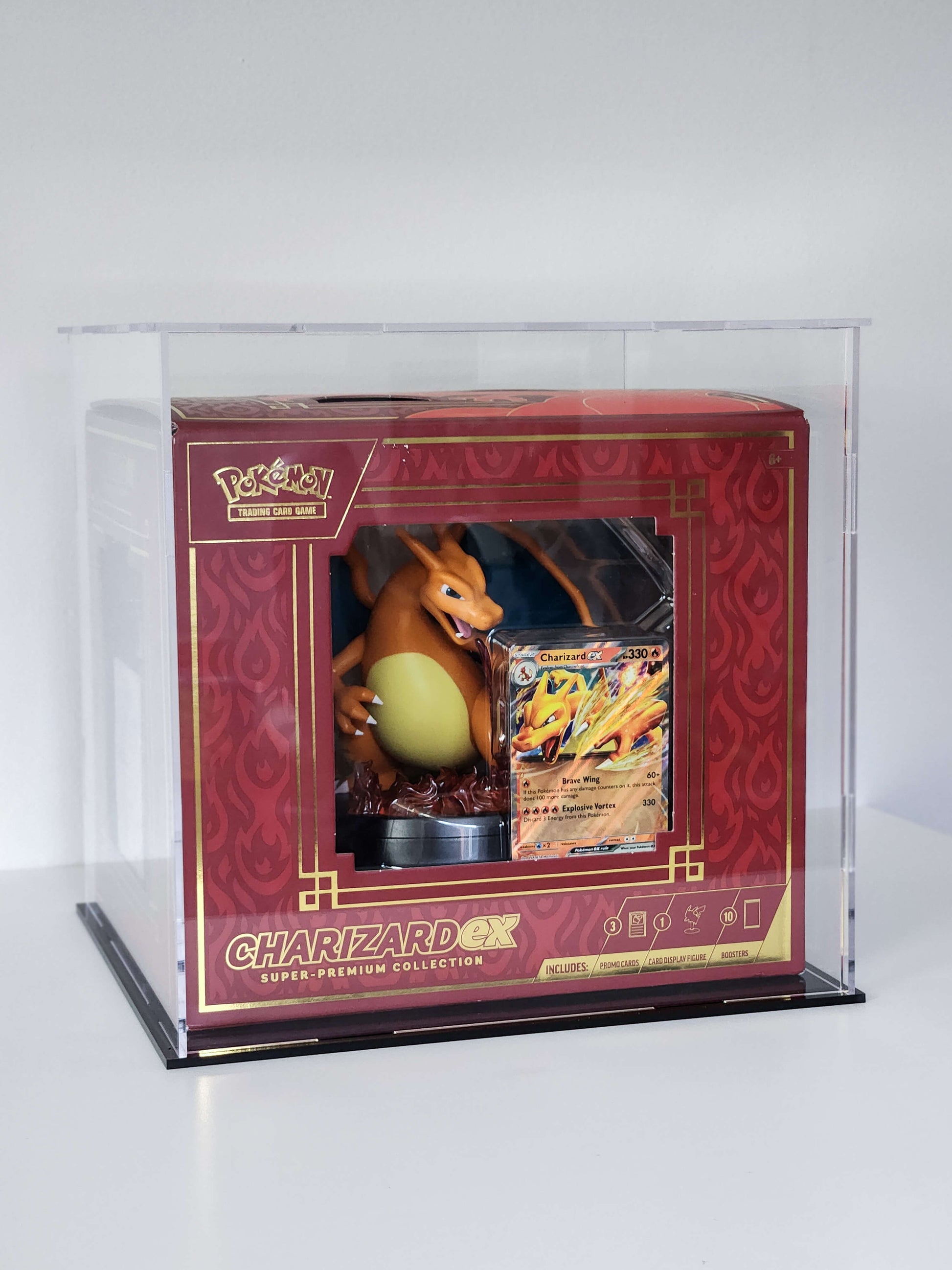 Pokémon Charizard trading card game collection in a clear display case