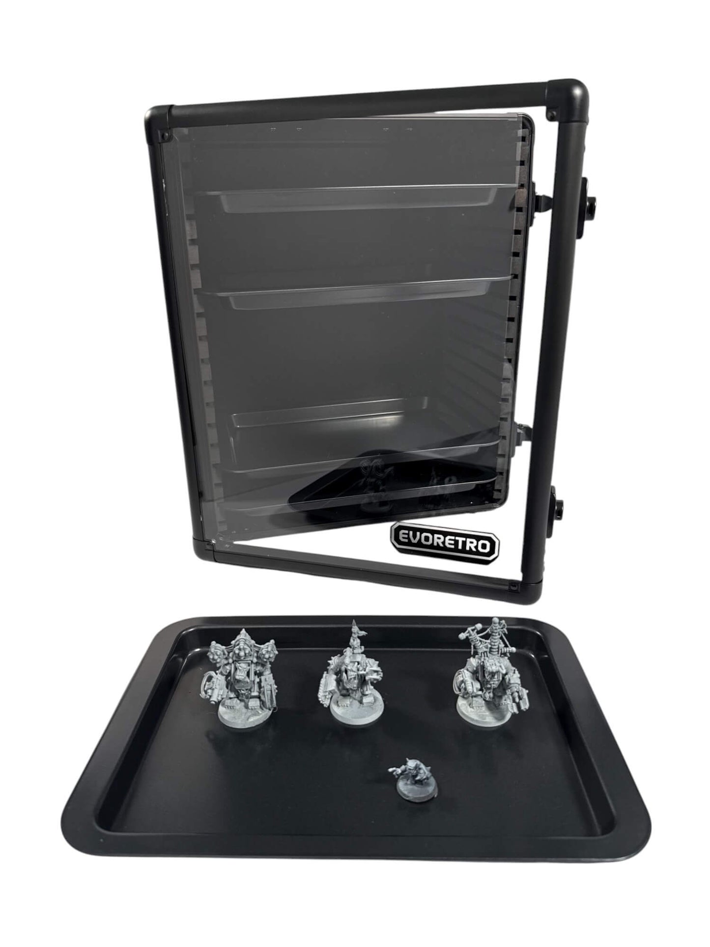 Black display case with figurines on a white background