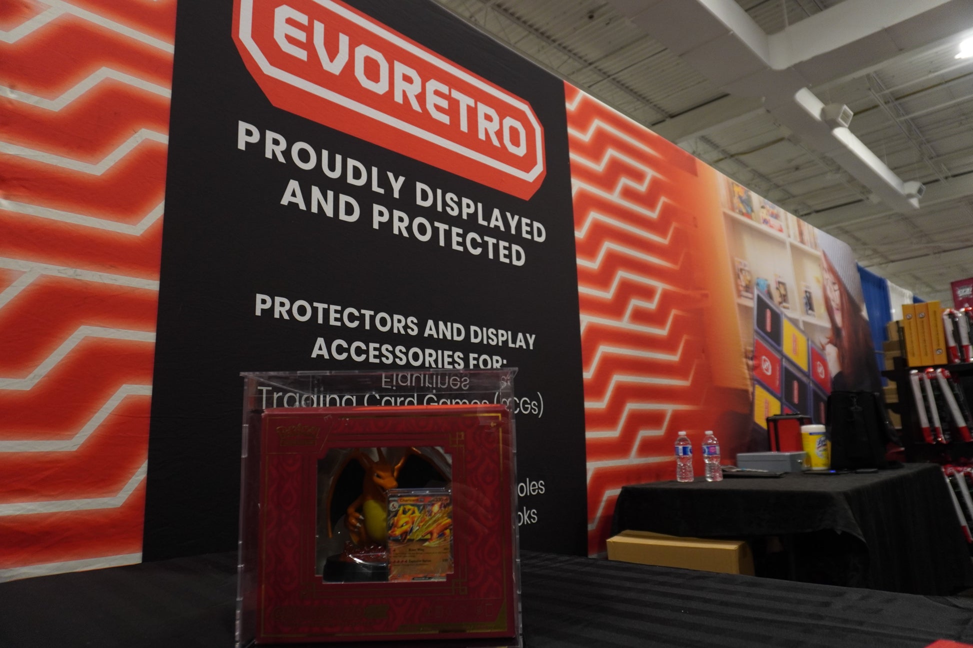 Display booth with Evoretro branding at a convention or trade show.