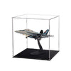 Model airplane displayed in a clear acrylic case on a white background
